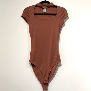 NWOT Rosebell Burnt Orange Cutout Bodysuit